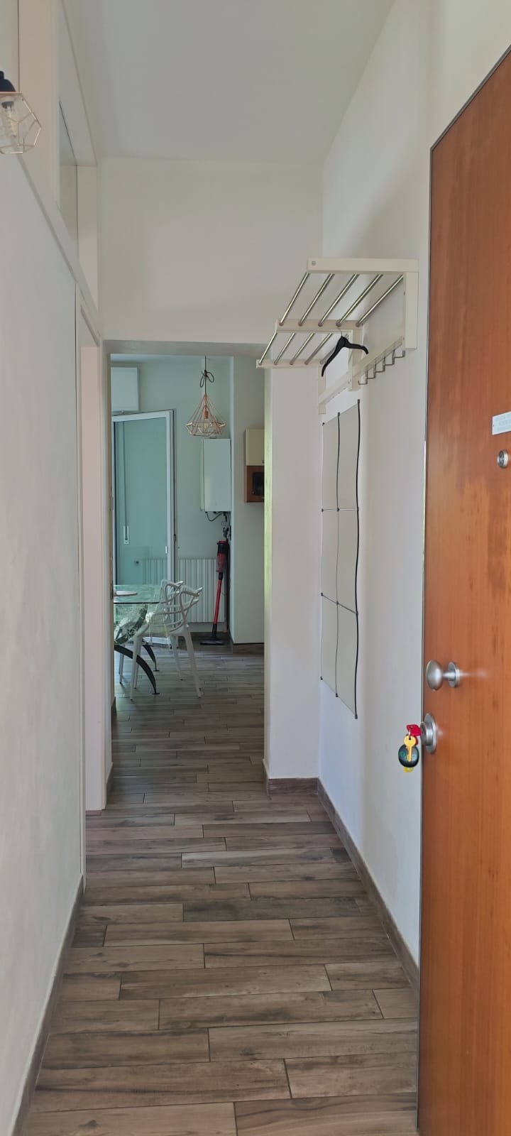 Apartment 3.Arancio — entrance corridor towards the interior
