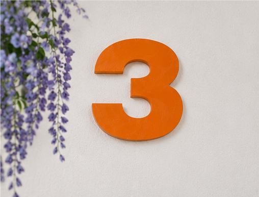 Apartment 3.Arancio — orange number 3 on the entrance wall