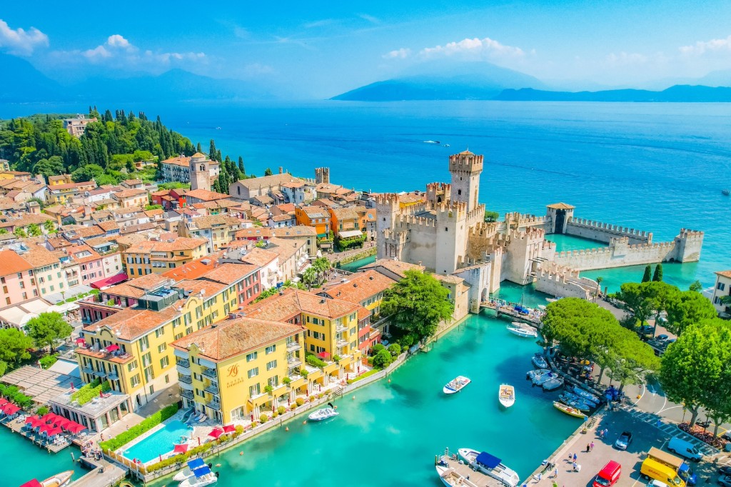 Aerial view of Sirmione: peninsula, Scaliger Castle and town on Lake Garda