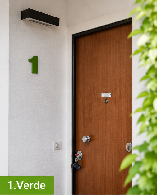 Apartment 1.Verde — entrance door with the green number 1 on the wall